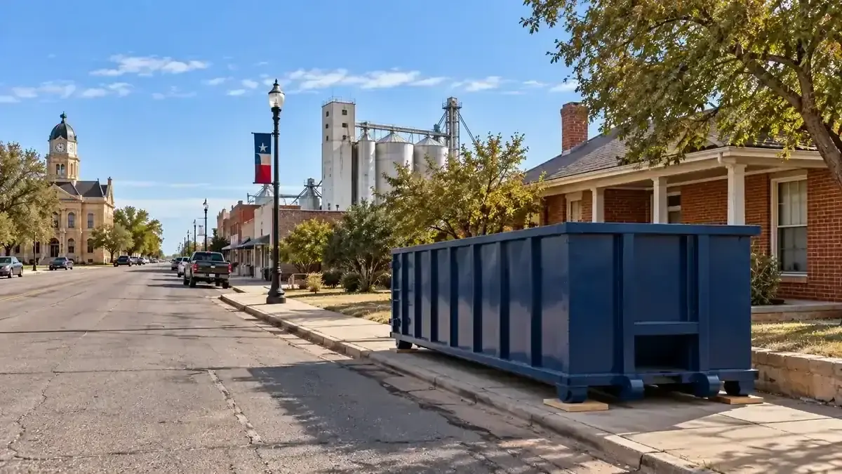 A roll-off dumpster on a street near the courthouse square in Panhandle, TX.