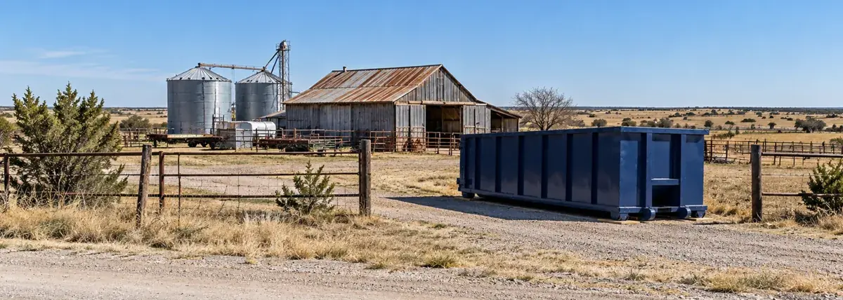 A roll-off dumpster at a rural ranch property near Washburn, TX.