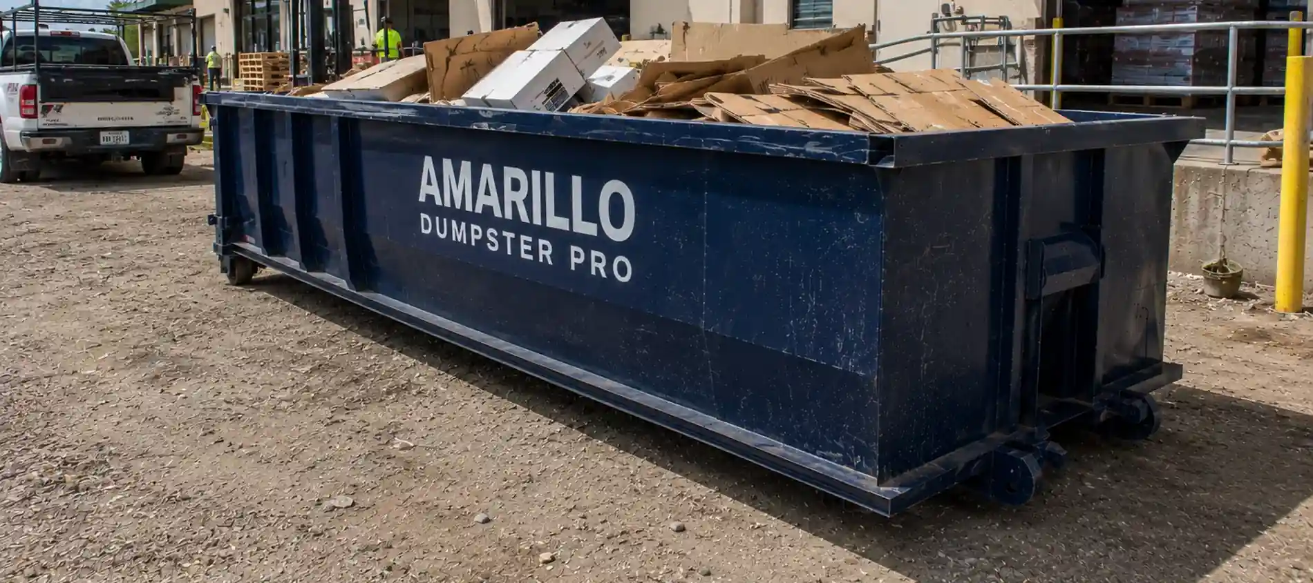 A roll-off dumpster loaded with yard waste and green debris in Amarillo, TX.
