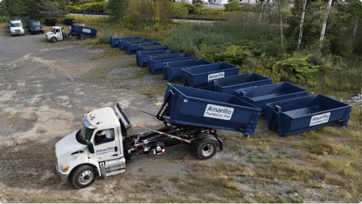 An aerial view of the Amarillo Dumpster Pro truck and dumpster fleet staged in the equipment yard